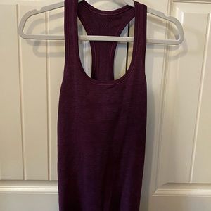 3 gorgeous sz 6 lululemon tank tops. Like new!